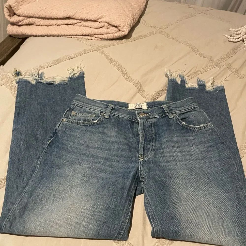 We The Free Distressed Hem Light Blue Jeans